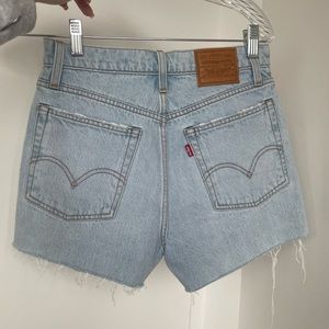 Levis high waisted jean shorts - light wash, mid length size 27 for summer vacay